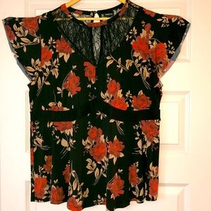 Torrid short sleeve floral top with lace cutouts